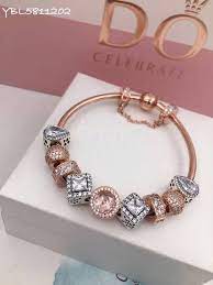 Made to perfection by highly skilled craftspeople, and set on a sterling silver core stamped with pandora's logo, the intricate glass charms are miniature works of art. Pandora Rose Gold Charm Bracelet 9 Pcs Charms Two Tone Pandora Rose Gold Bracelet Pandora Bracelet Designs Charm Bracelet