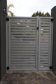Slat Fencing Perth Contact Simply Slat Fencing For Timber Effect Aluminium Slats Powder Coated Aluminium Slats Sl Patio Fence Fence Gate Design Fence Design
