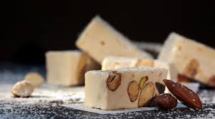 Combine the white chocolate chips and butter. Torrone The Traditional Christmas Nougat