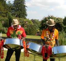 He plays the keyboard, steel drums, guitar and sings, creating soothing island sounds. Steel Band Hire Caribbean Steel Drummers For Weddings Warble Entertainment