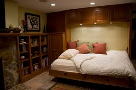 Little did he know that murphy beds would sweep the world with his innovating idea of saving space and yet having a great looking area when folded away. Basement Murphy Bed Houzz