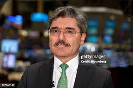 Sean Marney takes down a campaign sign for former U.S. representative...  News Photo