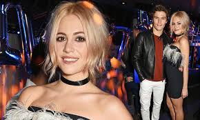 Pixie Lott with handsome beau Oliver Cheshire at BAFTA party