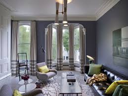 Black bricks complement other neutral tones like white or grey—allowing colors like green to fully pop with personality. Paint Living Room Ideas Decorpad