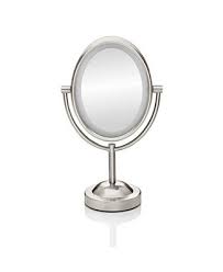 It creates a radiant glow for you, and the stylish design will why have one mirror when you can have two? Conair Double Sided Lighted Oval Mirror Reviews Home Macy S