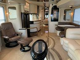 When retracting the slides in the newell, the floor actually drops about 4 into the chassis. 2003 Newell 45 Class A Coach Diesel Pusher Motorhome True Rv True Rv