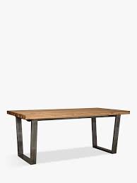A wooden table has always been considered a luxury acquisition. John Lewis Partners Calia 8 Seater Dining Table