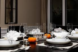 A few things to point out … the knife blade faces toward the plate to help prevent any accidental cuts when picking up the knife. Thanksgiving Dinner Table Setting Stock Image Image Of Candle Glowing 162969223
