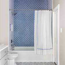Consider draping fabric from the ceiling to add softness to a hard ceramic tile or boring bathtub/ shower area. 16 Stylish Shower Curtain Ideas