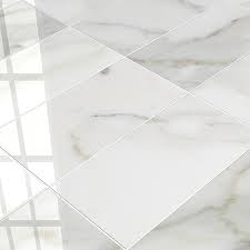 Calacatta sky porcelain floor and wall tile by american olean gives the luxurious look of marble with the durability of porcelain Where To Buy Marble Tiles