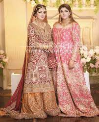 Barat Bride With Her Sister Pakistani Bridal Couture Asian Bridal Dresses Asian Wedding Dress Pakistani