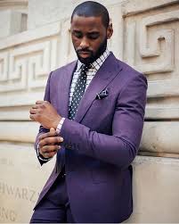 Black And Purple Suit Jacket Dapper Scene Magazine On Instagram The Joker S Style Is No Joke Cc Prettyflysociety Www Dapperscene Com Wedding Suits Men Dark Skin Men Purple Suits