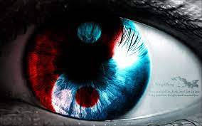 Download Yin Yang 4K Red And Blue Eye Closeup Wallpaper | Wallpapers.com