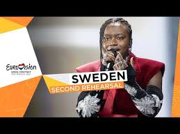 verse 1 there's fire in the rain but we'll get up again we're thousand miles apart but chorus can you hear a million voices calling out in the rain? Tusse Voices Second Rehearsal Sweden Eurovision 2021 Lattexter