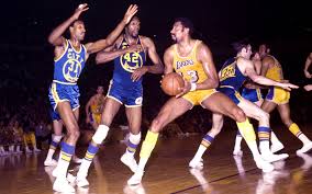 Wilt Chamberlain running high school track... : rpics