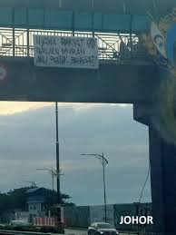 Use translate.com to cover it all. Banner Drop Action By Malaysian Comrades Southeast Asian Anarchist Library
