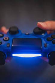 Playstation controller wallpaper 75 images. Person Holding Blue Sony Ps4 Controller Hd Wallpaper Wallpaper Flare