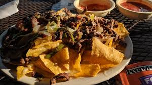 Green peppers, red peppers and sliced onions, sautéed and brought to you in a sizzling hot skillet. Las Margaritas Rowlandweb