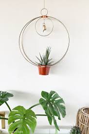It has been graced with round beads and welded rings. Diy Wood Leather Plant Hanger Made In A Day