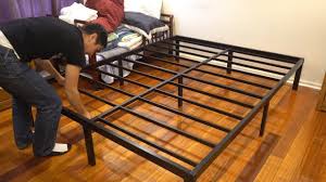 Learn how to build a queen size storage bed, perfect for organizing all of your totes, luggage, and whatever else you need put away. Noah Group Megatron Metal Bed Frame Assembly And Review Queen Size Youtube