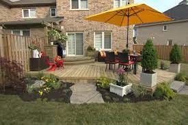 Here, different furniture groupings and paths divide a small backyard landscape into attractive and restful seating nooks. 37 Beautiful Landscaping Ideas Around Deck
