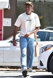 5 Summer Style Lessons From Tyler The Creator White Footwear Fashion Streetfashion J Tyler The Creator Outfits Tyler The Creator Fashion Tyler The Creator