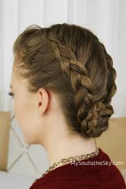 The style is really a crowd puller and will certainly make a statement. Double Dutch Braided Bun