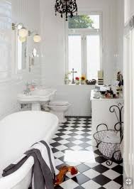 Black And White Bathroom Ideas Photos Take A Dip Into Our Beautiful Double Ended Clawfoot White Bathroom Designs Bathroom Tile Designs Black White Bathrooms