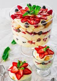 Layer whipped cream, nuts, cake, cookies, and fruit for the ultimate sweet treat. An Angel Berry Trifle That S Perfect For Easter Brunch Made With Fresh Berries Angel Food Cake And An Out Trifle Recipes Easy Easter Brunch Food Trifle Recipe