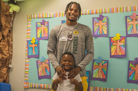 Former Mississippi State and Ole Miss football player and current NFL wide  receiver Malik Heath stopped by campus to bring Easter baskets for his son  MJ Heath Jr.'s entire class and take
