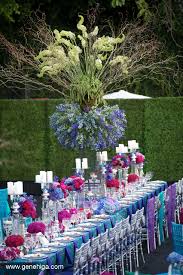 See more ideas about flower arrangements, floral arrangements, arrangement. Blue And Teal Dinner Party With 10 Ft Tall Centerpieces Designed By Wildflower Linen Wedding Table Flowers Wedding Arrangements Table Arrangements Wedding
