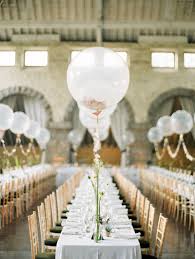 A Scottish Highlands Wedding At Coos Cathedral With A Raimon Bundo Weddding Dress And A Craspedia And Succulent Bouquet Photographed By Ann Kathrin Koch Wedding Balloon Decorations Wedding Balloons Wedding Centerpieces
