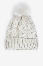 A simple secure method for fastening pom pom or other embellishments to your knitting or crocheting. Buy Oatmeal Sparkle Cable Knit Pom Hat From Next Germany