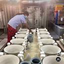 Midaya Ceramic Company - Kamani carefully loading the kiln for the ...