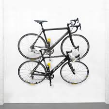 Effective Mounted On Wall Bike Racks Design Featuring Multiple Bike Featured As Simple Home Bike Storage Example Design Bike Storage Bike Storage Stand Wall Mounted Bike Storage