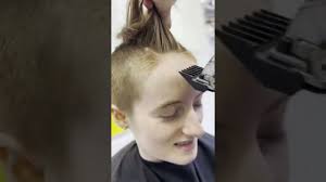 Siblings shave their heads to raise funds for Ukraine