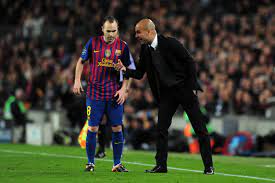 I know with barcelona you won five trophies in the first season. Iniesta How Pep Guardiola Transformed Barcelona Forever