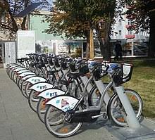 The surrounding area looks very nice with the lake. List Of Bicycle Sharing Systems Wikipedia Worddisk