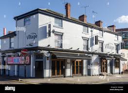 The Village Inn gay pub in Hurst Street, Birmingham which has live cabaret  and drag acts Stock Photo - Alamy