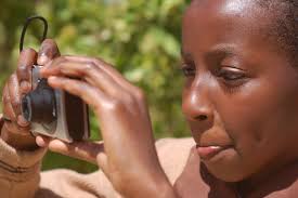 Kenyan schoolgirl taking pictures