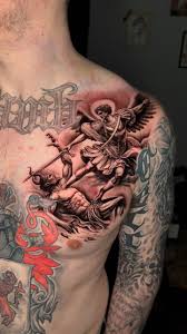 St Michael slaying the demon fit perfectly in this spot to fill in the  chest. , #lafacetattoos #bostontattooartist #bostontattoos #stmichaeltattoo  #stmichael #chesttattoo