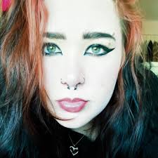 What is the little building being constructed in front of Shoe Station and  Ross?