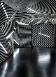 Ministry Of Design Creates Race Robotics Lab Exhibition Design Design Black Space