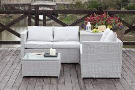 Canapé 2 places de jardin en résine tressée. Salon De Jardin En Resine Tressee Coffre Silang Gris Clair