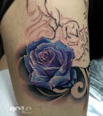 Let's go ahead and look at flower meanings for tattoos, specifically. Blue Roses Tattoo Elegant Arts Tattoo