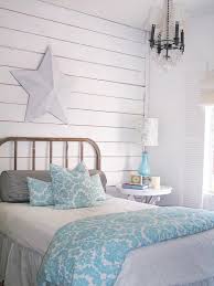 Close up view of wooden decoration with white curtain lace, blue cloudy sky. 49 Beautiful Beach And Sea Themed Bedroom Designs Digsdigs