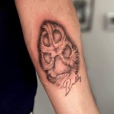 The brown color gamut conveys severity and ferocity of this mammal, and the tribal claws complement the motif. 30 Best Dog Paw Tattoo Meanings And Designs Saved Tattoo