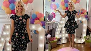 This morning presenter highlights petite waist in elegant skirt #fashion #fashionidea #fashionstyle #styleidea. Holly Willoughby S This Morning Outfit Today Where Is Her Floral Peplum Dress From Heart
