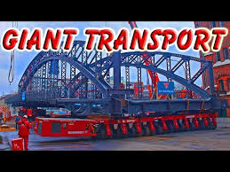 Eine tiefliegende rohrbrücke stellte sich dem samt ladung etwa sieben meter hohen transport in den weg. Mammoet Heavy Transport Moving Giant Bridge On Spmt Modular Trailer Youtube