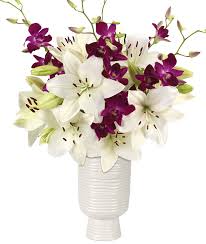 Layered vintage while orchids are often associated with glam or modern wedding styles, we love how this floral designer utilized the white blooms alongside pampas grass to bring a boho, whimsical feel to the. Lilies Orchids Bouquet Calyx Flowers Inc